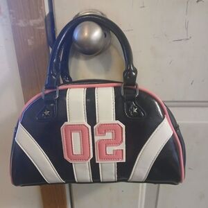 pink and black handbag